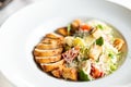 Romain salad with grilled chicken, garlic croutons and parmesan