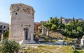 Roman Agora in Athens, Greece. Tower of Winds, and Acropolis in distance Royalty Free Stock Photo