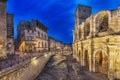 Roman amphitheatre at dusk in Arles, France