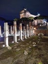 Roman ancient columns with Victorian monument at the background