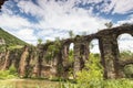 Roman aqueduct of Nikopolis against beautiful cloudy sky in Gree