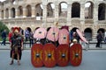 Roman army battle array near colosseum at ancient romans historical parade Royalty Free Stock Photo