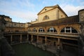 Roman Bath, UK - December 6, 2013: Tourists visiting inside Roman Baths complex. City of Bath is a UNESCO World Heritage Site. Se Royalty Free Stock Photo