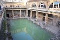 Roman Bath, UK - December 6, 2013: Tourists visiting inside Roman Baths complex. City of Bath is a UNESCO World Heritage Site. Se Royalty Free Stock Photo