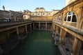 Roman Bath, UK - December 6, 2013: Tourists visiting inside Roman Baths complex. City of Bath is a UNESCO World Heritage Site. Se Royalty Free Stock Photo