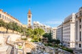 Roman baths ancient ruins site, modern buidings and Saint Louis Cathedral of the Capuchin Fathers Latin Catholic church in the