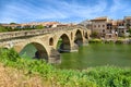 Roman bridge across the Arga river in Puente la Reina Royalty Free Stock Photo