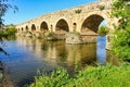 Roman bridge over the Guadiana river in the monumental city of Merida, Royalty Free Stock Photo