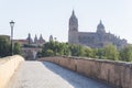 Roman bridge over the Tormes river and in the background the cathedral of Salamanca (Spain Royalty Free Stock Photo