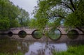 Roman bridge reflection on river Bosna in Sarajevo