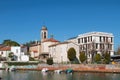 Roman Catholic Church and city channel. San Giuliano, Rimini, Italy Royalty Free Stock Photo