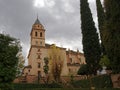 Low angle view on Church of Santa Maria de Alhambra,Granada, Spain, on a cloudy day Royalty Free Stock Photo