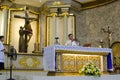 Roman Catholic priests celebrates congregation homily mass at chapel altar