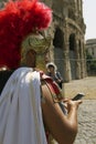Roman Centurion with Cell Phone at the Colosseum in Rome