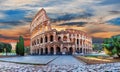 Roman Coliseum at sunset, summer view under the clouds, Italy