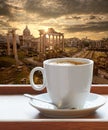 Roman Forum, also known as Forum of Caesar against cup of fresh coffee in Rome, Italy Royalty Free Stock Photo