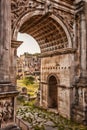 Roman Forum with Arch against sunset in Rome, Italy Royalty Free Stock Photo