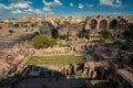 Roman Forum, arches and columns in Rome, Italy. Antique ruins of historical landmarks.