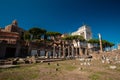 Roman Forum, arches and columns in Rome, Italy. Antique ruins of historical landmarks. Royalty Free Stock Photo