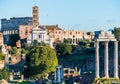 Roman Forum in Rome, Italy with ancient columns and Colosseum Royalty Free Stock Photo