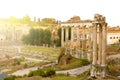 Roman Forum in Rome, Italy. Antique structures with columns. Ruins of ancient italian roman town. Sunrise above famous Royalty Free Stock Photo