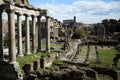 The Roman Forum ruins with the Temple of Saturn and the Dioscuri, the Basilica Julia, and the Palatine Hill, Rome, Italy Royalty Free Stock Photo