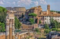 The Roman forum, view on the Coliseum, the Temple of Venus Genetrix Ruins, The Temple of Venus and Roma and the Tower of the Milit Royalty Free Stock Photo