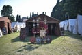 Roman legionary camp with tent, shields, helmets and army insignia