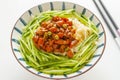 Roman noodle with pork sauce and cucumber close up. Chinese food. Za Jiang Mian