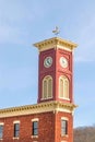 Roman numeral clock tower building