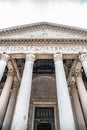 Roman Pantheon - detailed front bottom view of entrance with columns and tympanum. Rome, Italy Royalty Free Stock Photo