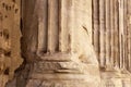 Roman pillar. Detail of the Temple of Hadrian on the Campus Martius in Rome, Italy. Antique marble column of Templum