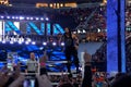 Roman Reigns wrestler stands on top turnbuckle before start of c Royalty Free Stock Photo