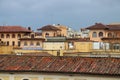 Roman residential skyline under grey clouds