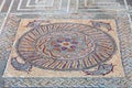 Roman ruins of Conimbriga. Close-up of a decorative Roman tessera mosaic pavement Royalty Free Stock Photo