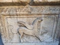 Roman sarcophagus limestone side view with griffin symbol Sremska Mitrovica Serbia