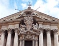 Roman statues on the roof of roman church.