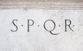 Roman symbol sign SPQR on white marble