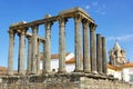 Roman temple and cathedral tower. Royalty Free Stock Photo