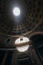 Roman temple Pantheon dome. The coffered dome has a central oculus as the main source of natural light in Rome, Italy Royalty Free Stock Photo