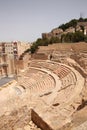 Roman theatre, Cartagena, Spain. Stage, columns and seats carved out of stone in the centre of the city. Royalty Free Stock Photo