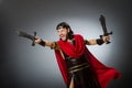 The roman warrior with sword against background Royalty Free Stock Photo