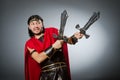 The roman warrior with sword against background Royalty Free Stock Photo