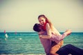 Happy couple having date on beach Royalty Free Stock Photo