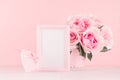 Romance celebration background for Valentine and wedding - luxury roses bouquet, gift box, heart, blank frame for text on wood.