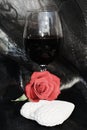 Romance, rose and red wine. Love image, close up Royalty Free Stock Photo