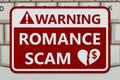 Romance Scam red warning sign on a computer keyboard Royalty Free Stock Photo