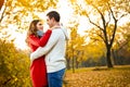 Romance between two young persons in autumn