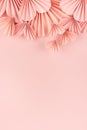 Romance Valentine day background - delicate pink ribbed paper hearts in asian style fly on pastel pink background, header border.