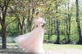 Romance woman holds bouquet of pink peonies. Bridesmade, bride